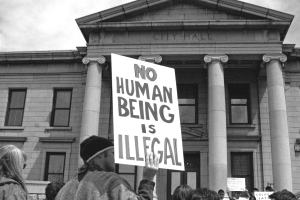 A sign at the SB 1070 protest in front of Colorado Springs City Hall last April.